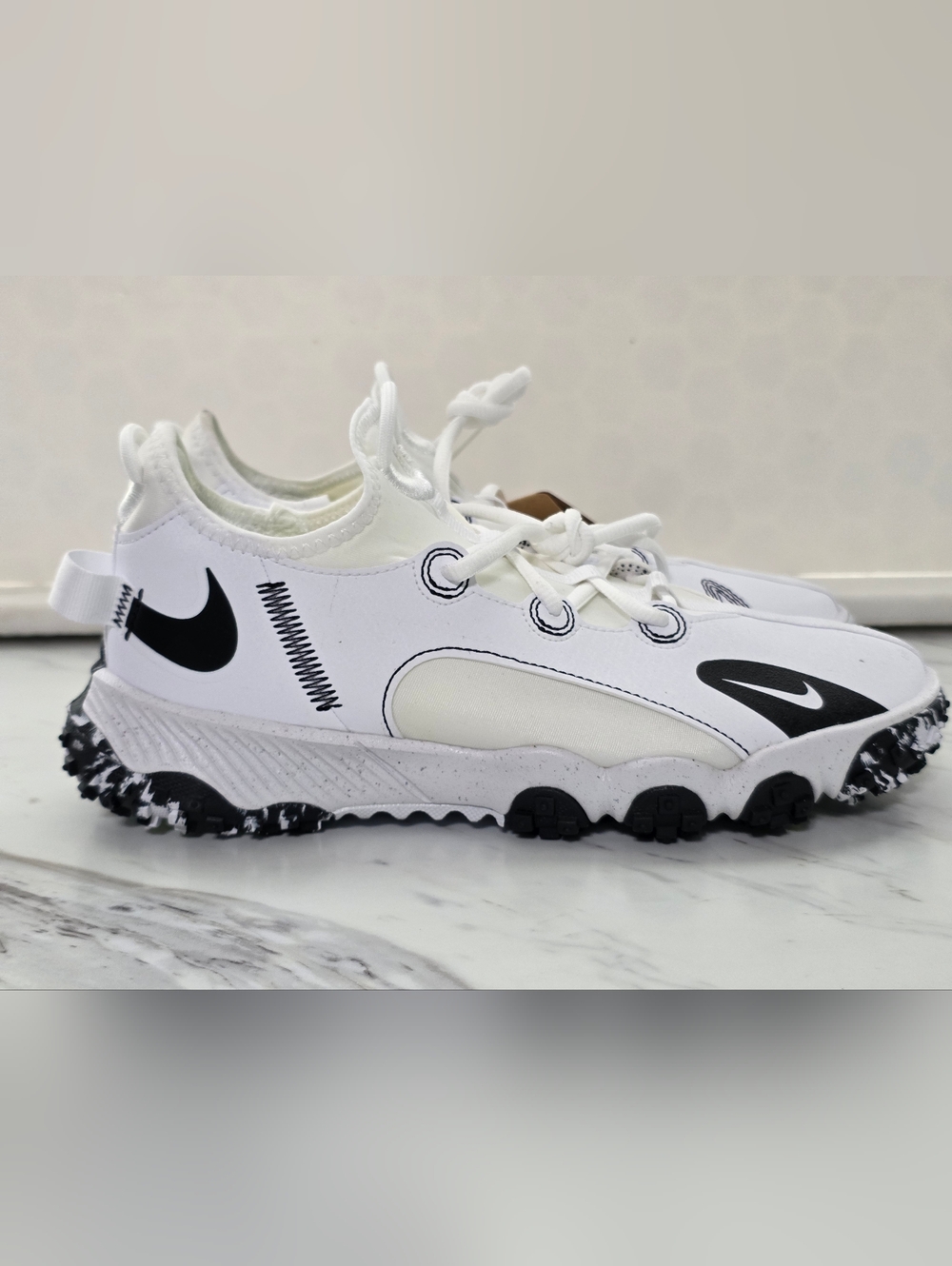 Nike Kids White Sneakers with Black Accents